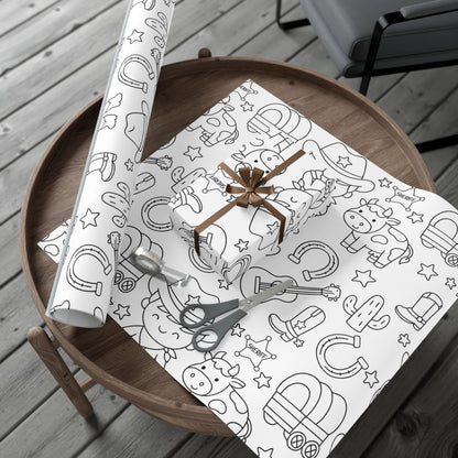 Gift wrap with cowboy-themed design on a wooden table