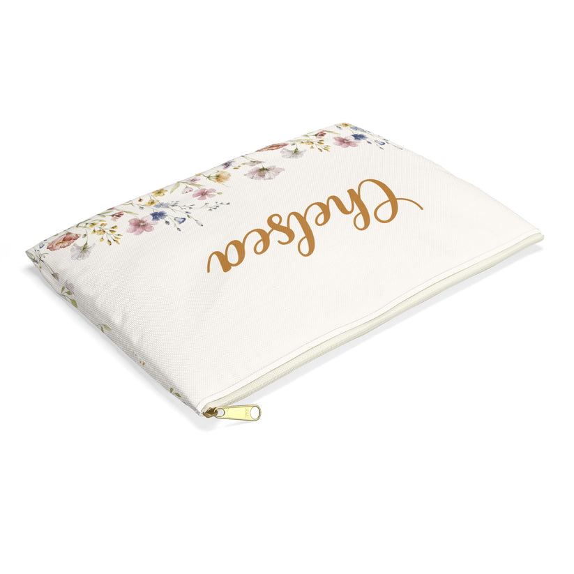 Floral-patterned pouch with 'Chelsea' branding on a white background