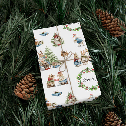 Christmas Victorian animal themed gift wrap personalized with Bailey, sitting on a bed of pine needles.