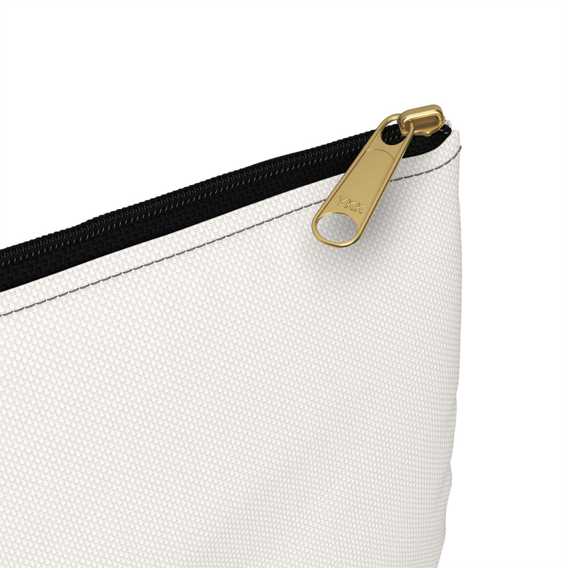 White pouch with a gold zipper on a white background