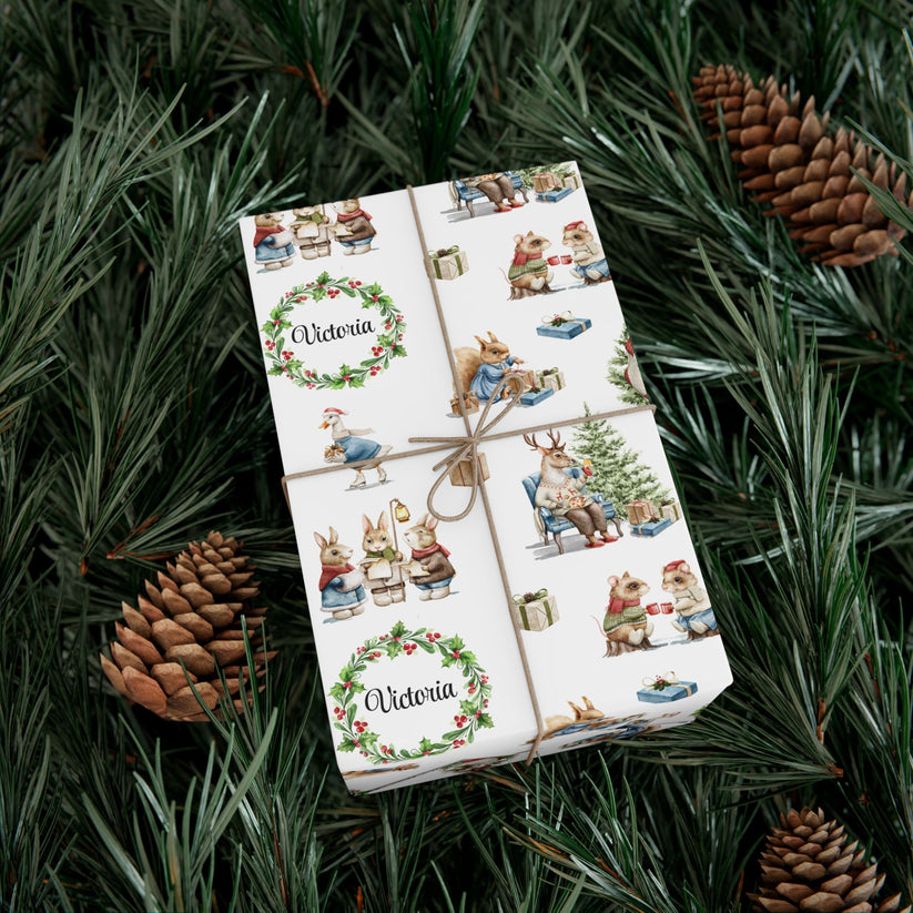 Christmas-themed gift wrap with illustrations of animals and wreaths on a green leafy background.