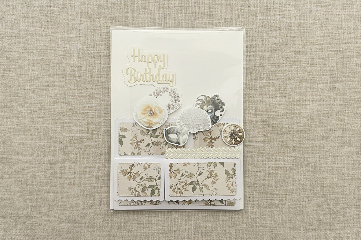 Decorative birthday card with floral designs and 'Happy Birthday' text on a black marble background.