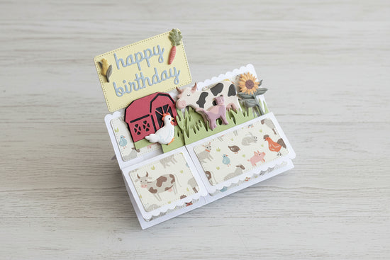 Folded pop-up birthday card with farm theme.