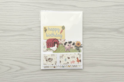 Folded pop-up card in packaging.