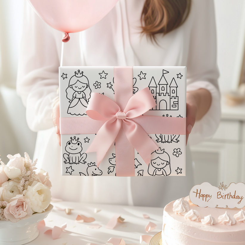 Gift box with pink bow and princess themed coloring wrapping paper held by a person, surrounded by flowers and a cake with 'Happy Birthday' sign.