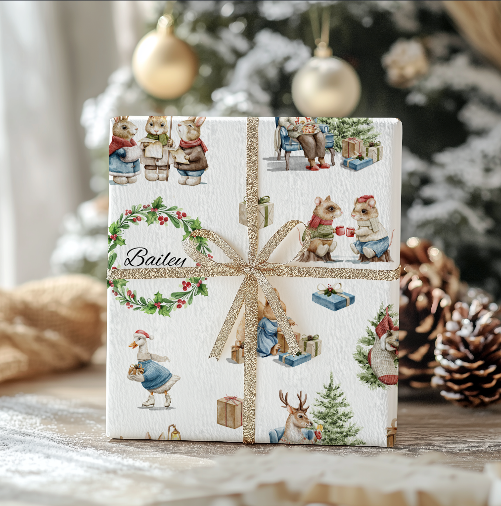 Gift box wrapped with Victorian themed animal illustrations and a wreath with "Bailey" in the middle.