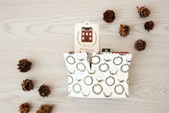 pop-up card folded on a white oak background