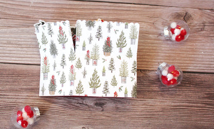 Folded box style pop-up card with Christmas theme shown on wooden background
