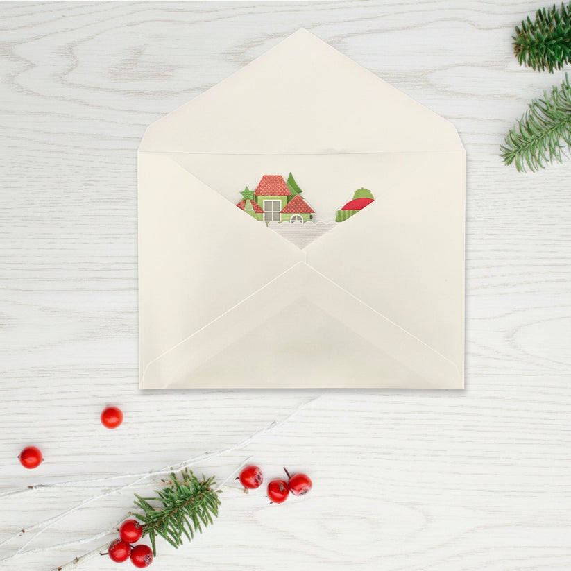 white envelope with box tyle pop-up card inside