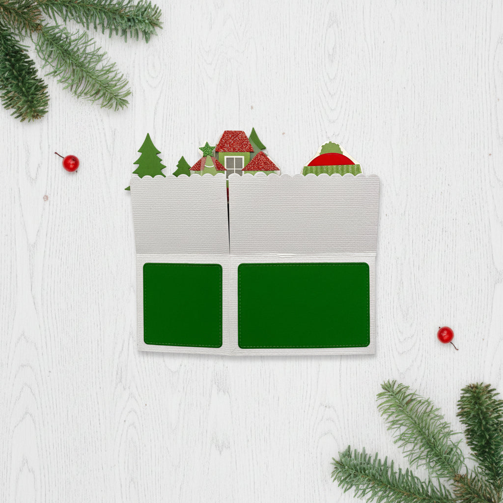 Christmas-themed box style po-up card with small trees and a house on a white background
