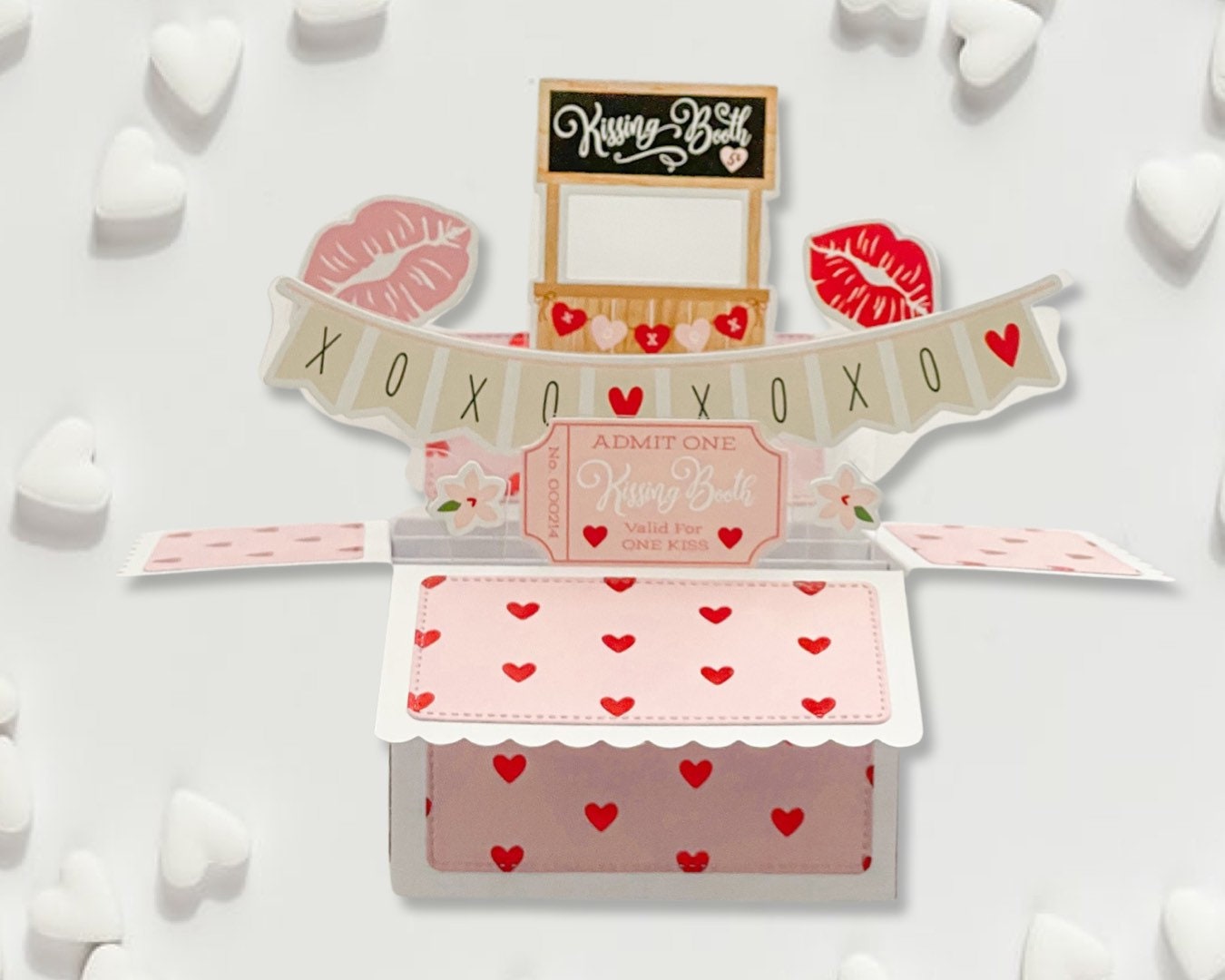 Valentine's Day card with heart patterns and a small standee on a white background