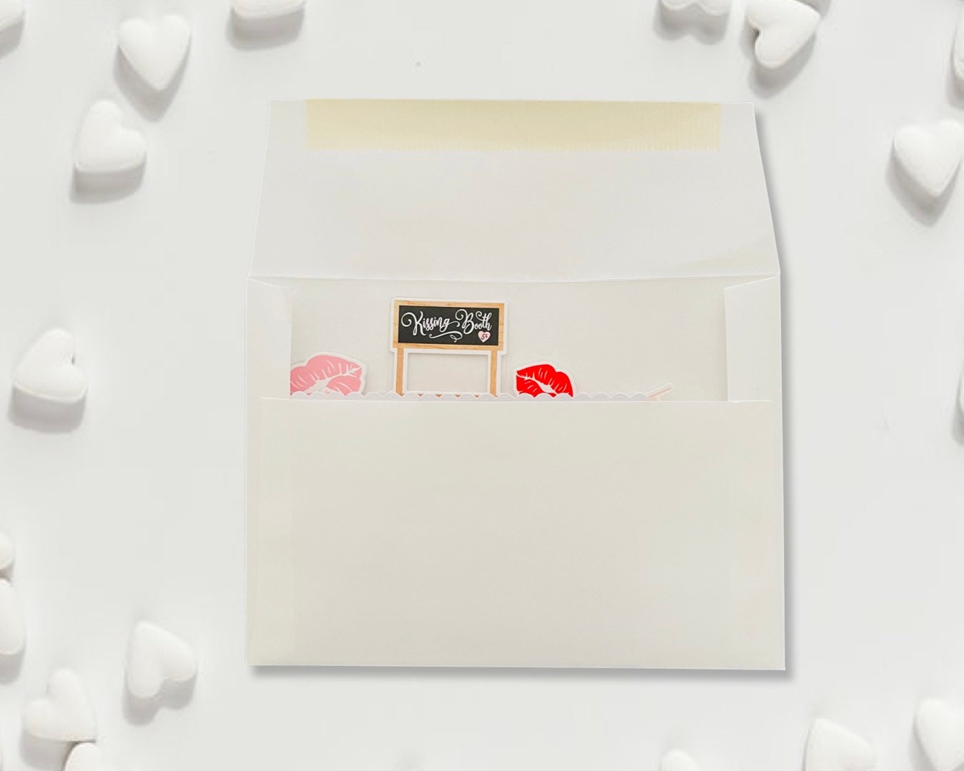 White pouch with decorative elements on a white background