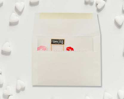 White pouch with decorative elements on a white background