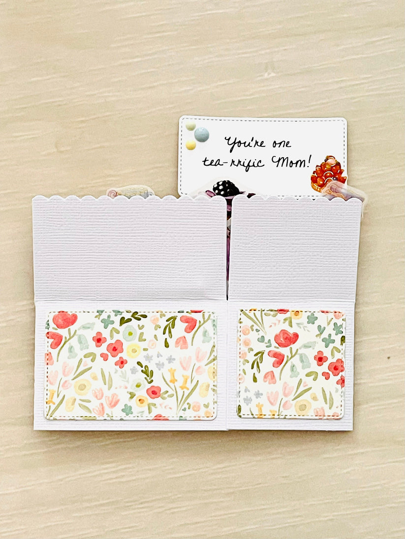 Mother's day pop-up card with tea party theme.  Floral accents and message of You're one tea-rrific mom.
