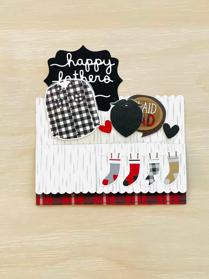Decorative card with Father's Day elements on a wooden surface