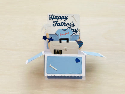 A 3D box pop-up card for Father's Day in blue and white, showing tools.