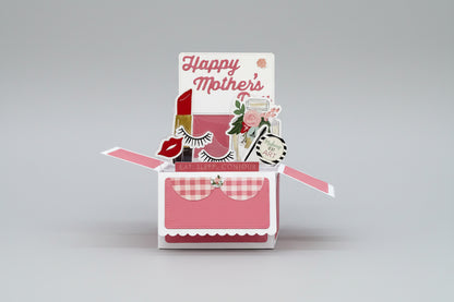 Pop-up card with 'Happy Mother's Day' text and cosmetic-themed elements on a beige background