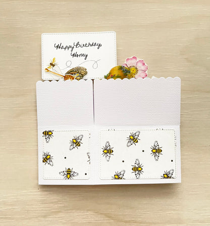 Folded bee themed pop-up card.