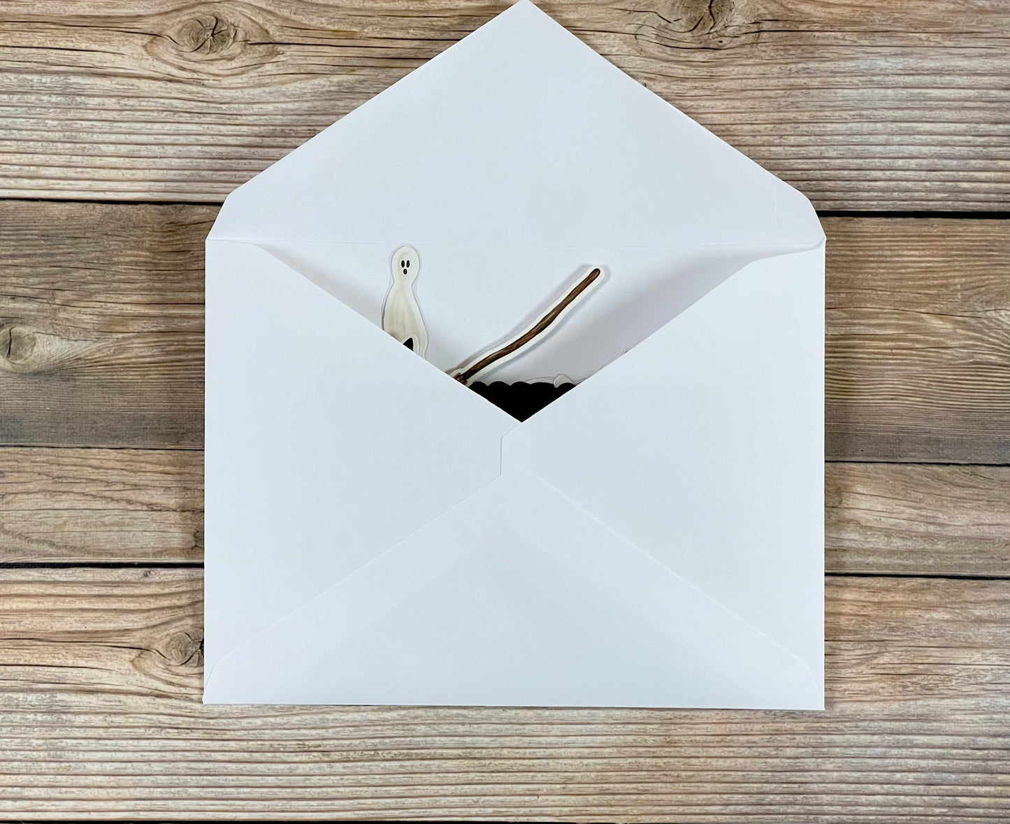 White envelope on a wooden surface