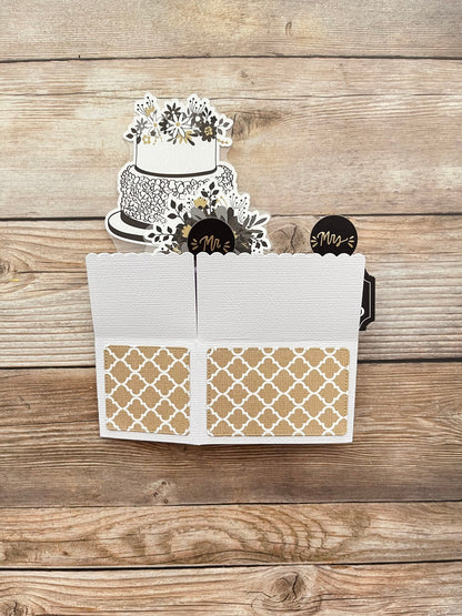 Decorative card with a cake on a wooden surface