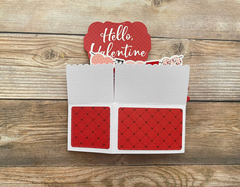 Valentine's Day card with 'Hello Valentine' on a wooden background