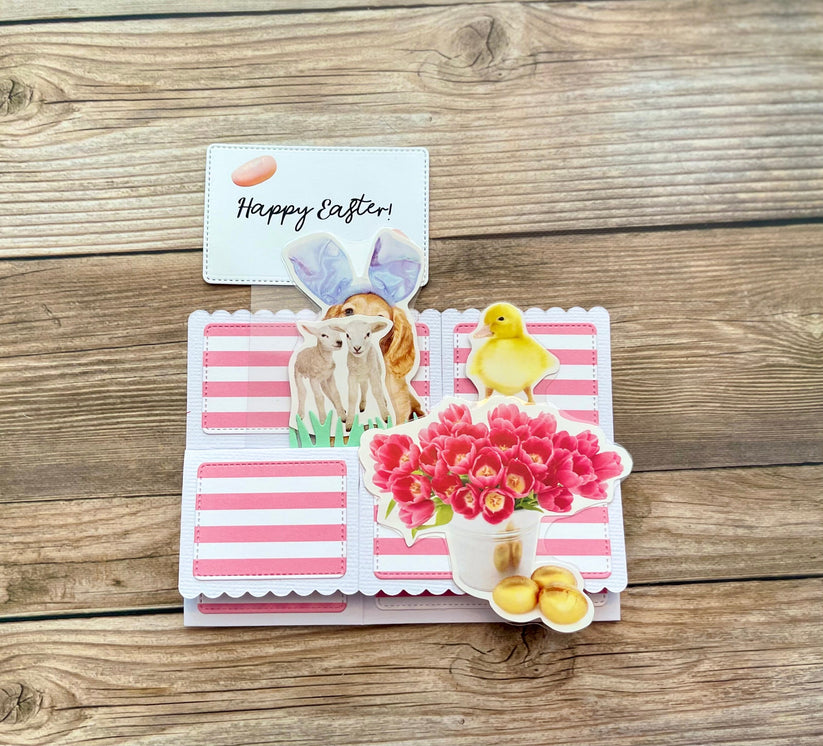 Easter-themed card with cartoon animals and flowers on a wooden surface