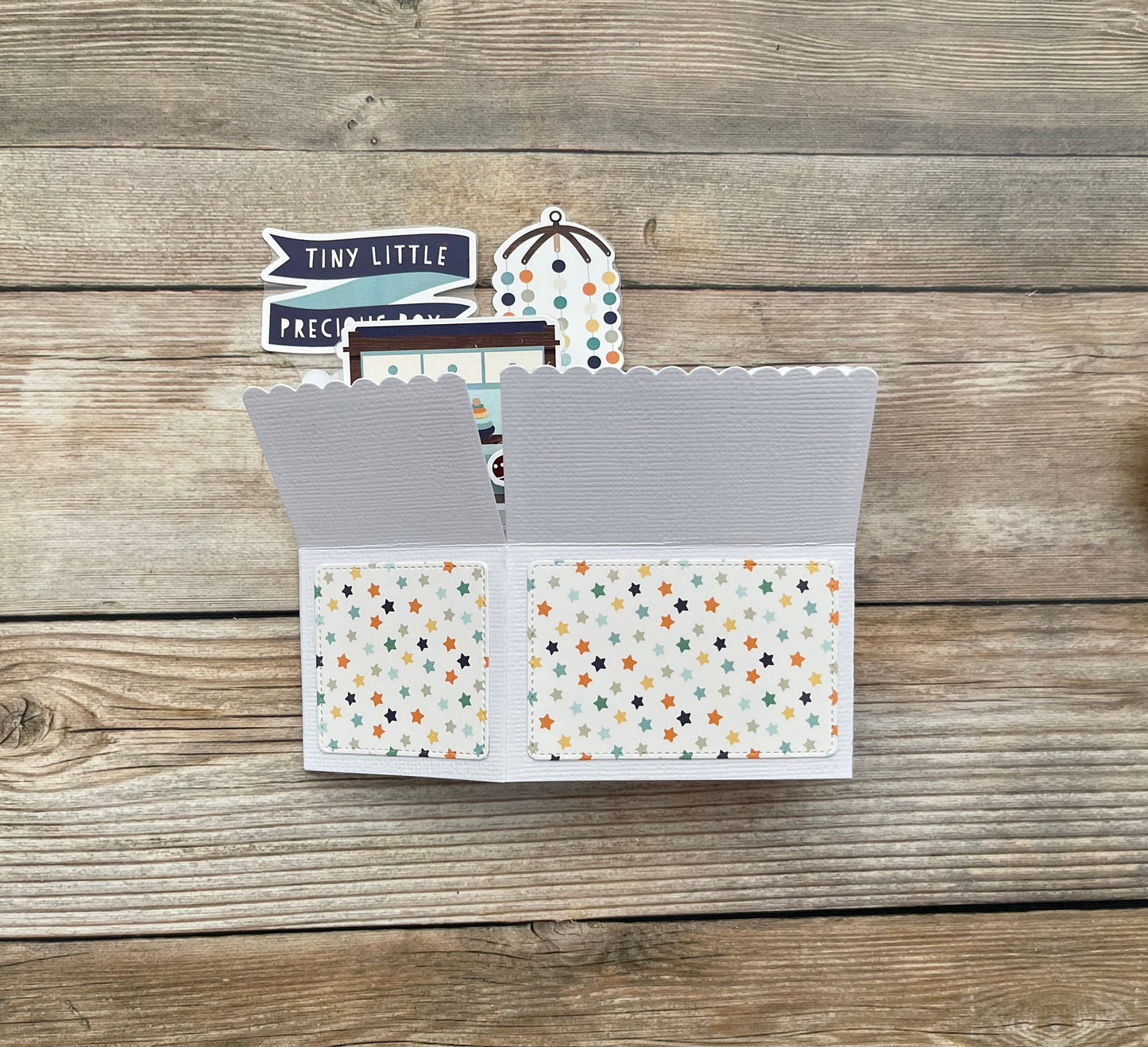 Small card with star pattern on a wooden surface
