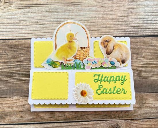 Easter-themed card with chicks, a bunny, and 'Happy Easter' text on a wooden surface.