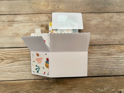 Back of folded box style pop-up card with baking theme.