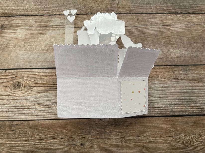 Back of folded box style pop-up card.