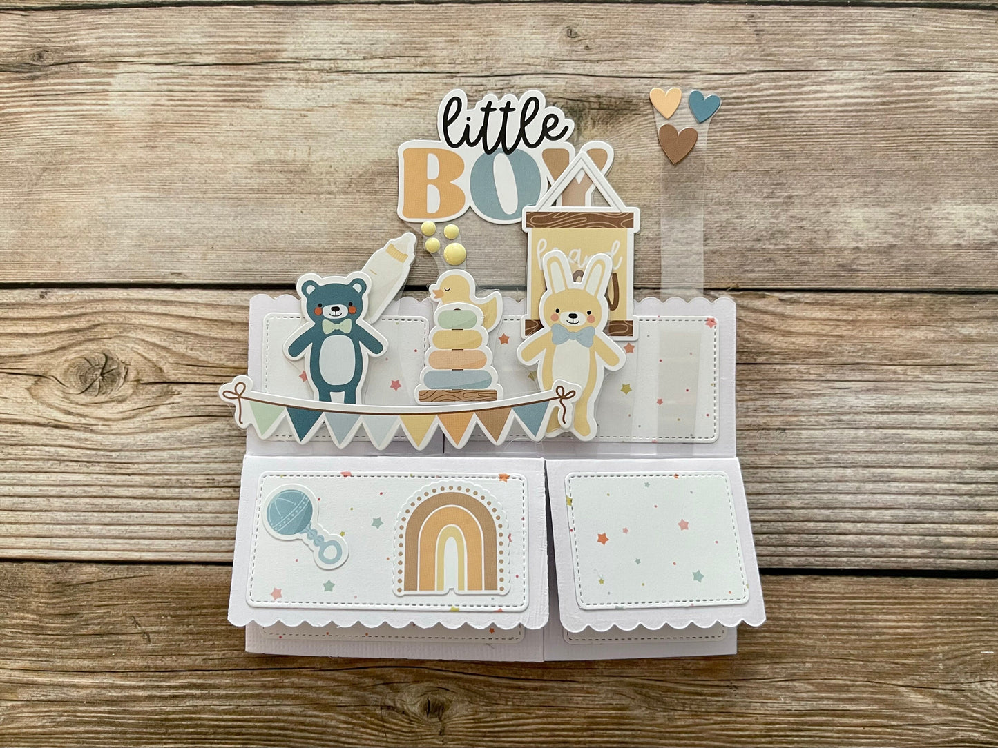 Children's birthday card with bear and rabbit illustrations on a wooden background