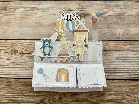Children's birthday card with bear and rabbit illustrations on a wooden background