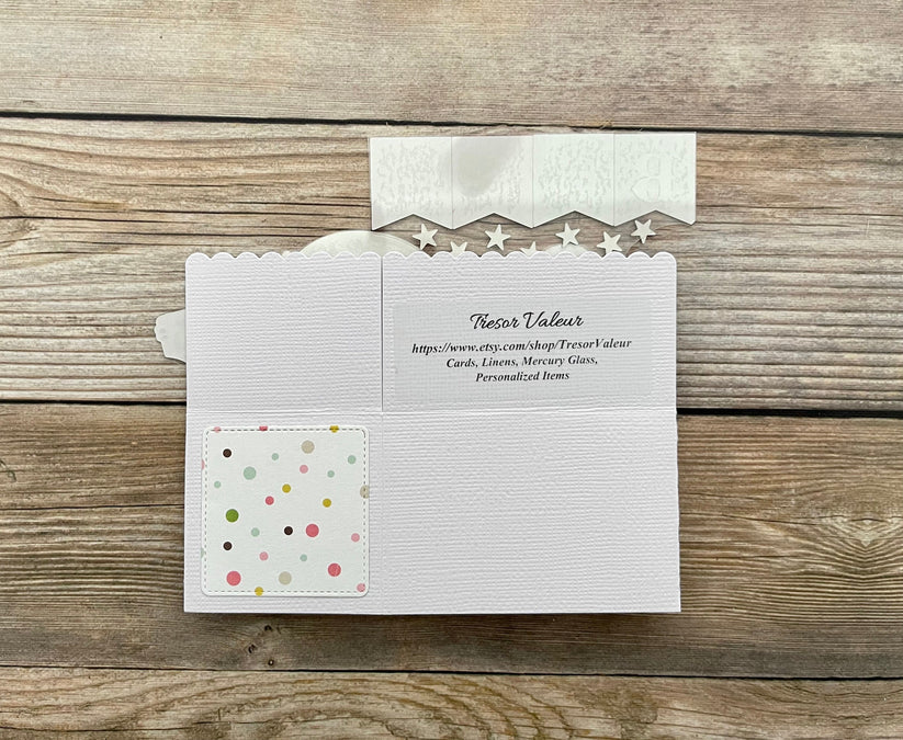 Back of a folded 3d pop-up card in a baby theme