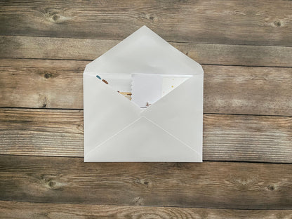 White envelope with pop-up card inside.