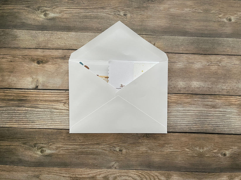White envelope with pop-up card inside.