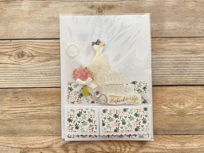 Decorative card with floral patterns and text on a wooden surface
