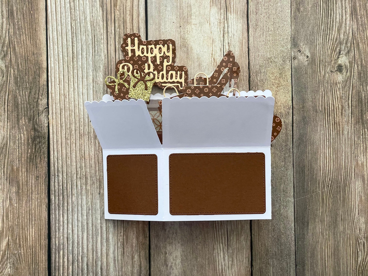 Decorative birthday card with chocolate-themed design on a wooden background