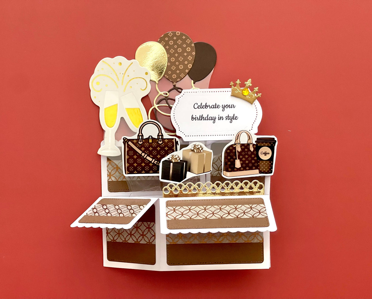 Pop-up birthday card with handbags and balloons on a red background