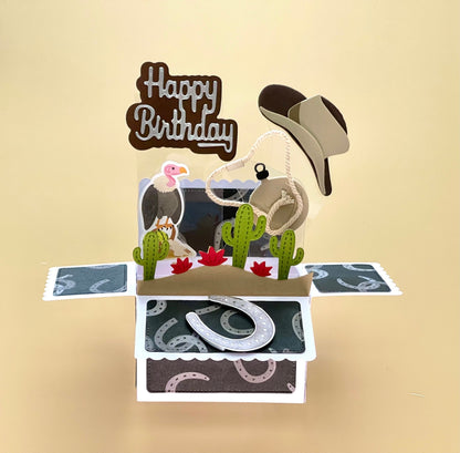 Pop-up birthday card with cowboy elements on a beige background