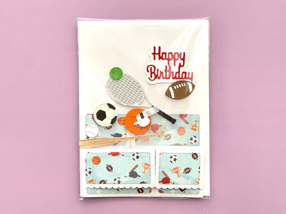 Birthday card with sports-themed illustrations on a pink background