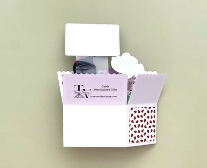 Card with a lady bug pattern  on a light green background