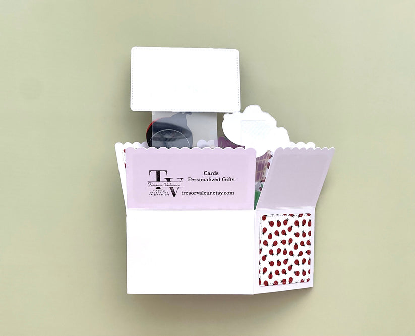 Card with a lady bug pattern  on a light green background