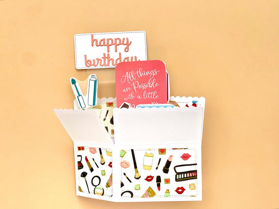 Decorative card with makeup illustrations and a birthday message on a beige background