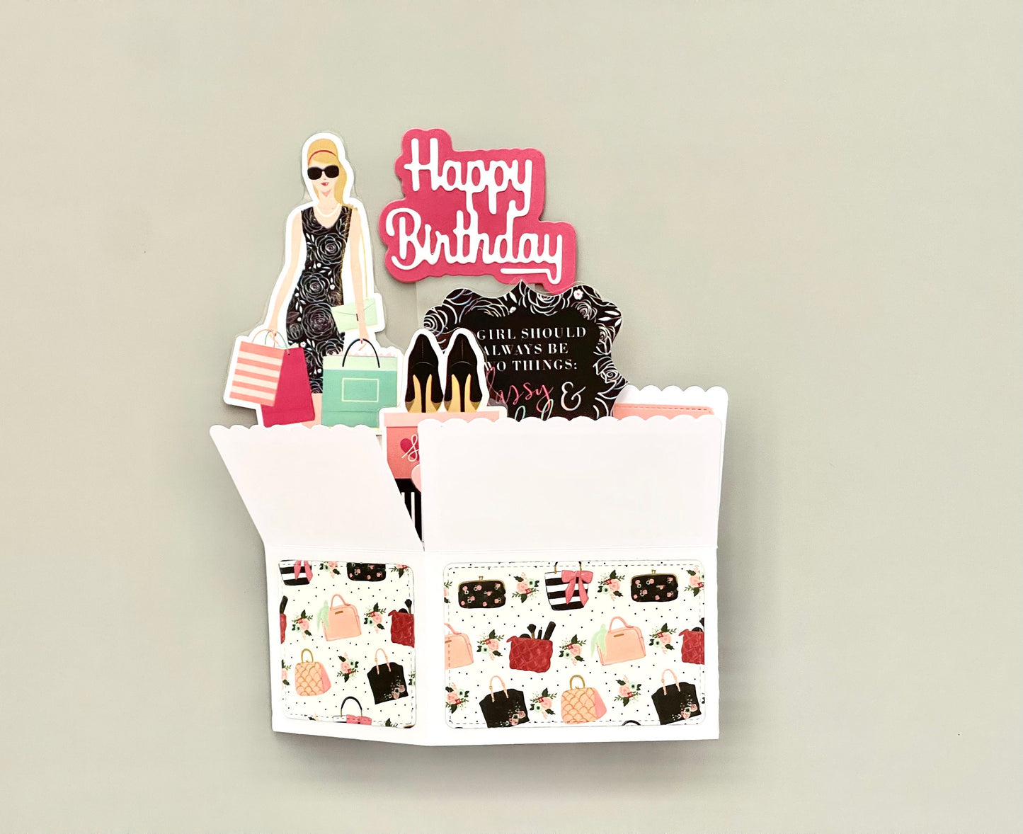 Decorative birthday card with a shopping bag and character on a beige background