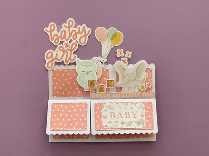 Decorative baby card with elephants and text on a purple background
