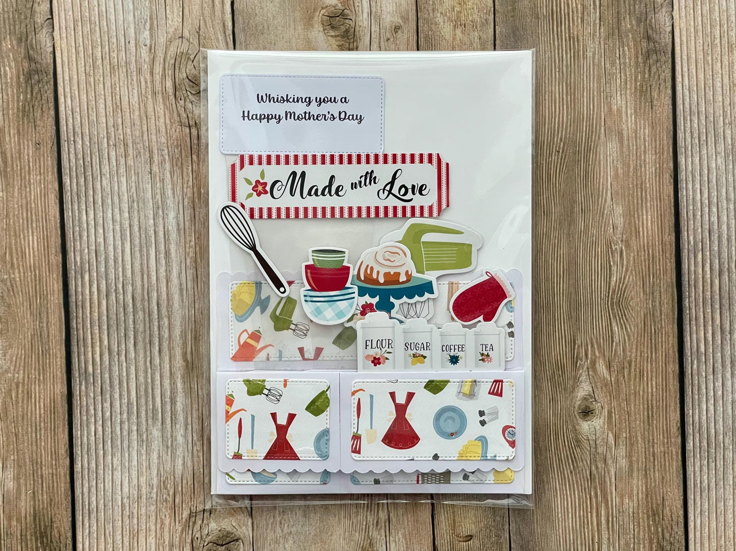 Greeting card with kitchen-themed illustrations and 'Made with Love' text on a wooden surface